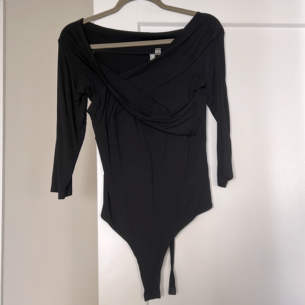Asymmetrical black bodysuit